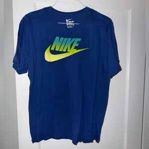 Nike Men's Blue Tee with Green Logo